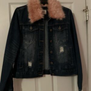 Denim jacket with pink fur collar